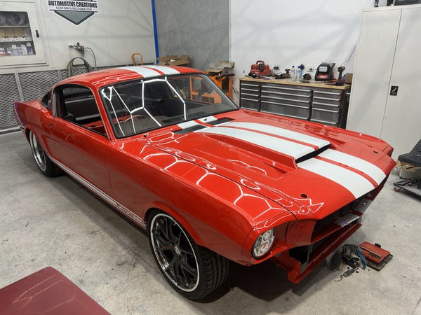 FRONT LEFT RED VEHICLE