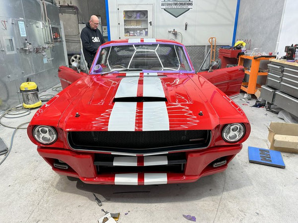 FRONT RED VEHICLE WHITE STRIPE